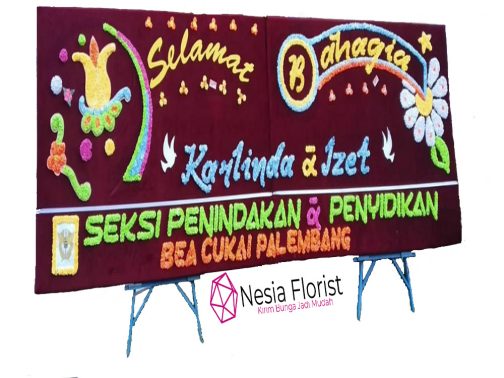 bunga papan Nesia Florist toko bunga Palembang